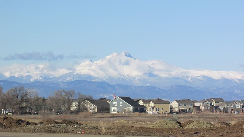 Longmont Braces, Hygiene Colorado, Longs Peak with houses in the foreground